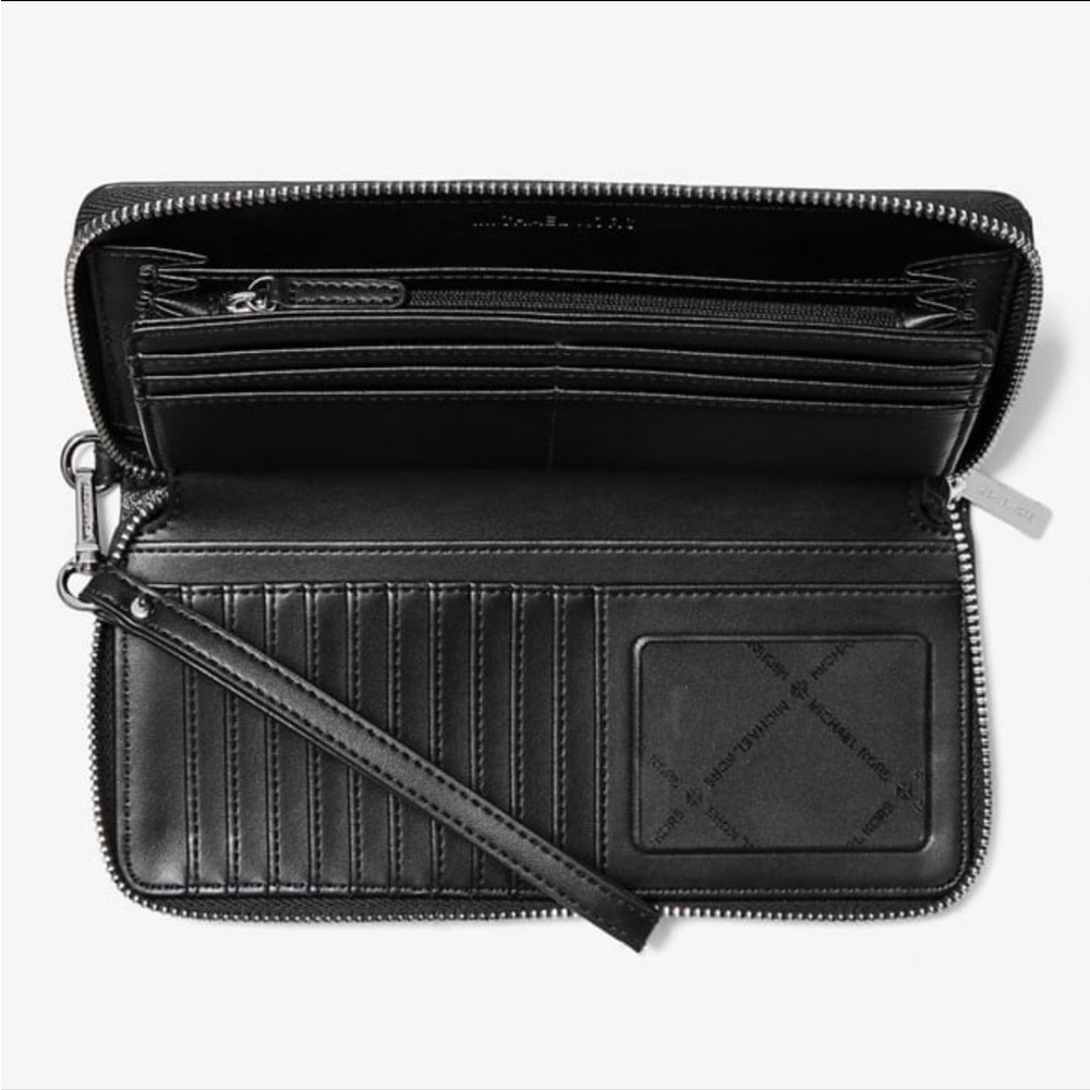 Michael Kors Jet Set Travel Large Signature
Logo and Metallic Continental Wallet - Picture 2 of 2